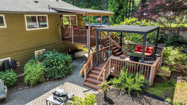 exterior space with stairway and a deck