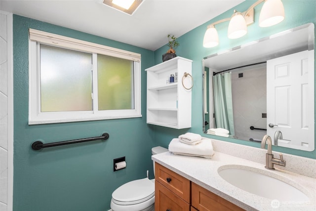 full bath with a shower with curtain, vanity, toilet, and visible vents