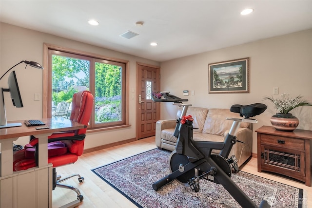 office with baseboards, recessed lighting, wood finished floors, and visible vents