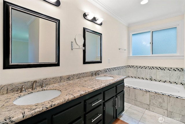 bathroom with crown molding, a sink, and a bath