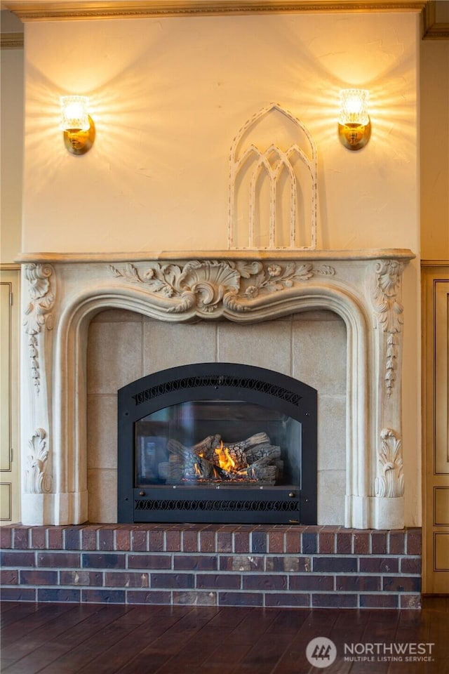 10910 48th Street Ct E, Edgewood, WA 98372 - detailed view of a warm lit fireplace