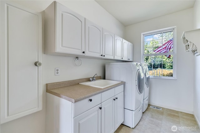 10910 48th Street Ct E, Edgewood, WA 98372 - laundry room with cabinet space and independent washer and dryer