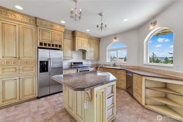 10910 48th Street Ct E, Edgewood, WA 98372 - kitchen featuring stainless steel appliances, cream cabinets, a chandelier, an island with sink, and recessed lighting