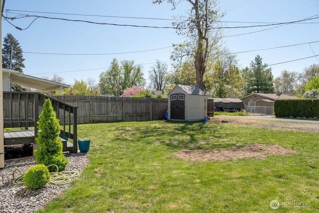 616 Pleasant St, Walla Walla, WA 99362 - view of yard featuring an outbuilding, a fenced backyard, and a storage unit