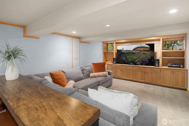 living room with light colored carpet and recessed lighting