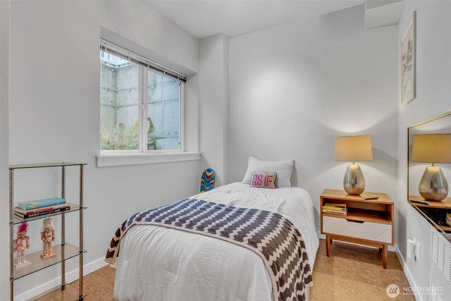 bedroom with baseboards