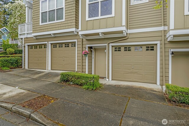 garage featuring driveway