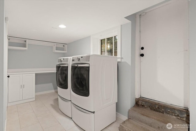 laundry room featuring washer and dryer, light tile patterned flooring, baseboards, and recessed lighting