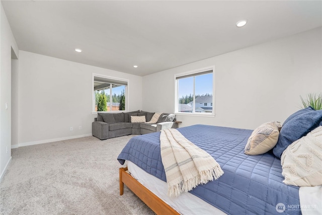 carpeted bedroom with recessed lighting and baseboards