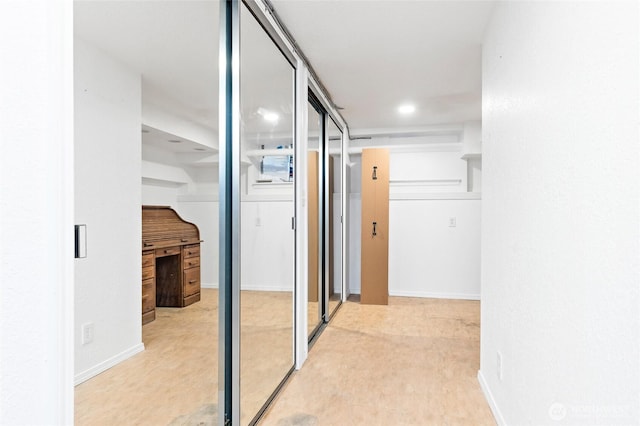 hallway with baseboards