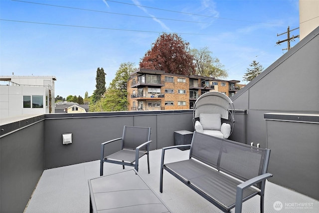 view of patio / terrace with a balcony