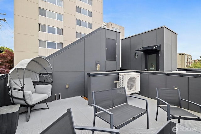 view of patio featuring ac unit