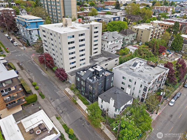 birds eye view of property featuring a view of city