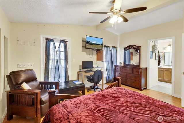 bedroom with light wood finished floors, baseboards, connected bathroom, and ceiling fan