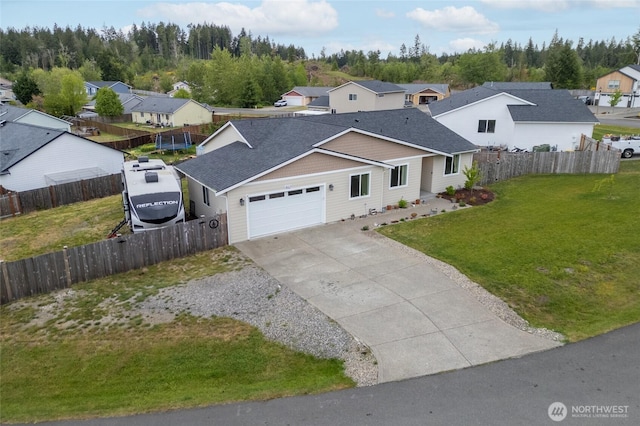 802 SE Cody St, Rainier, WA 98576 - view of front of property with a residential view, driveway, an attached garage, and roof with shingles