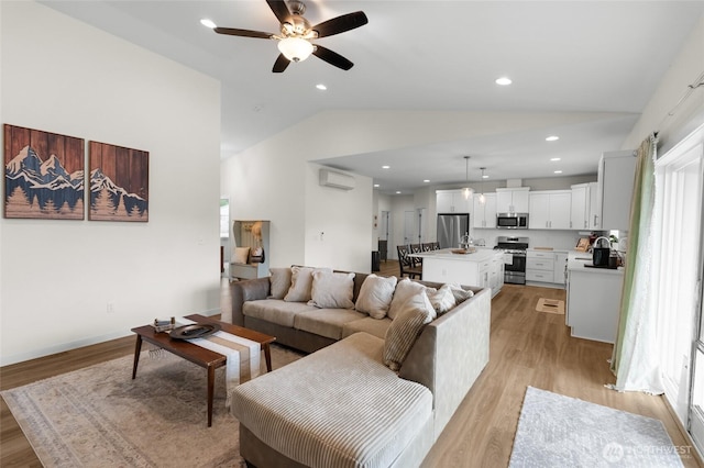 802 SE Cody St, Rainier, WA 98576 - living room featuring a wall mounted AC, lofted ceiling, light wood finished floors, a ceiling fan, and recessed lighting