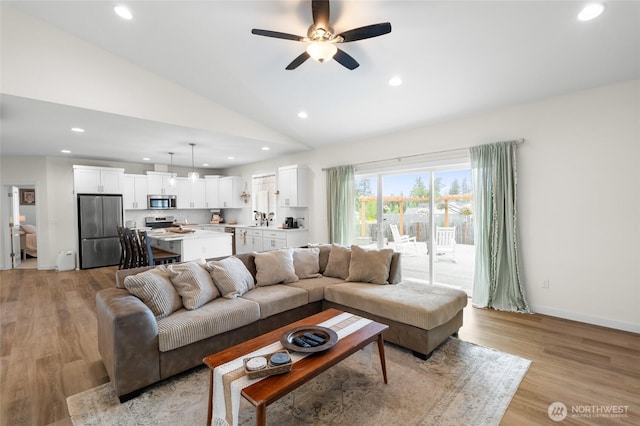802 SE Cody St, Rainier, WA 98576 - living area featuring vaulted ceiling, light wood-type flooring, recessed lighting, ceiling fan, and baseboards