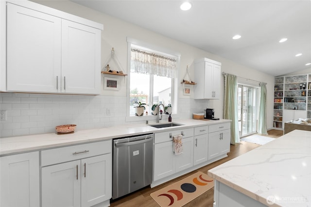 802 SE Cody St, Rainier, WA 98576 - kitchen featuring stainless steel dishwasher, a sink, white cabinets, wood finished floors, and recessed lighting