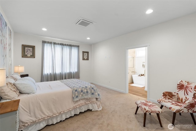 802 SE Cody St, Rainier, WA 98576 - bedroom featuring light colored carpet, baseboards, recessed lighting, and ensuite bath