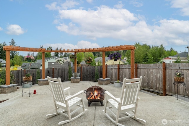 802 SE Cody St, Rainier, WA 98576 - view of patio / terrace with an outdoor fire pit and a fenced backyard