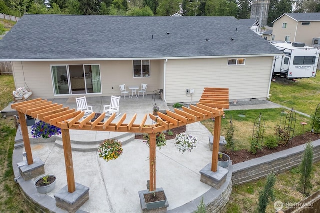 802 SE Cody St, Rainier, WA 98576 - back of house with a patio area, a pergola, and roof with shingles
