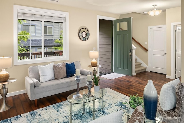 365 NE Denny Way, Issaquah, WA 98029 - living room featuring baseboards, dark wood-type flooring, and stairway