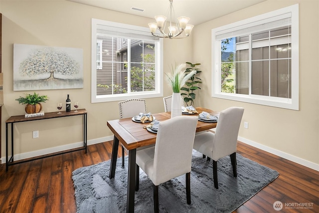 365 NE Denny Way, Issaquah, WA 98029 - dining space with a chandelier, baseboards, and wood finished floors