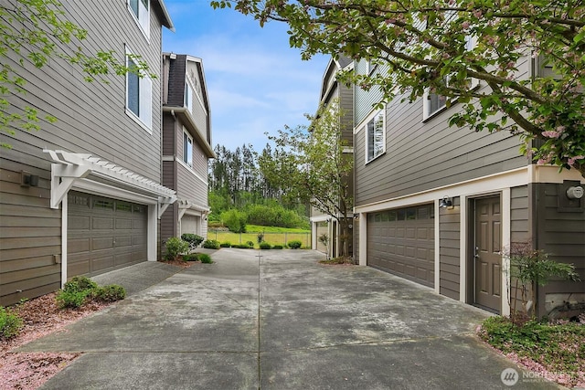 365 NE Denny Way, Issaquah, WA 98029 - garage with concrete driveway