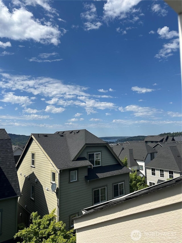 365 NE Denny Way, Issaquah, WA 98029 - exterior space with a balcony and roof with shingles