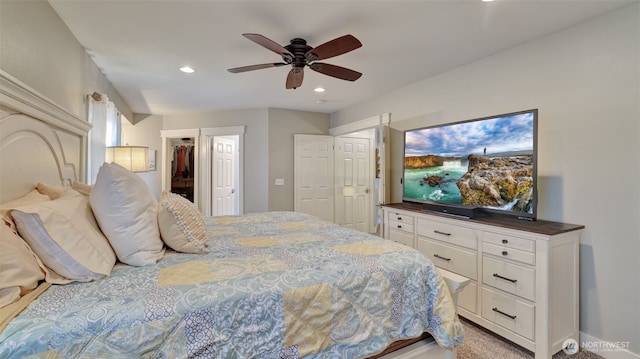 bedroom with recessed lighting, a ceiling fan, a spacious closet, and a closet