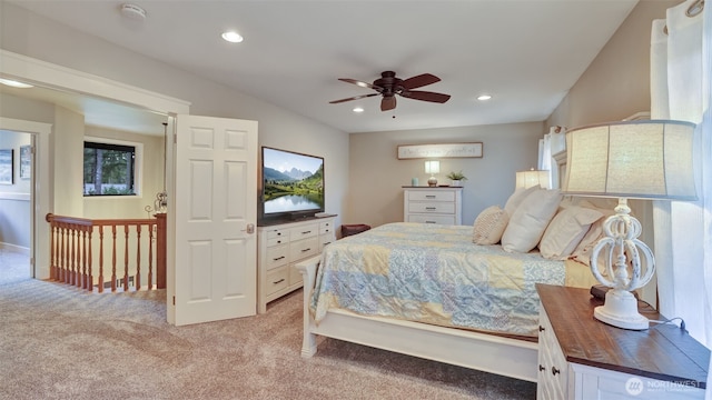 bedroom with recessed lighting, a ceiling fan, and light carpet