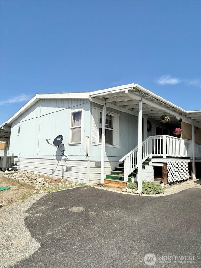 manufactured / mobile home featuring central AC unit