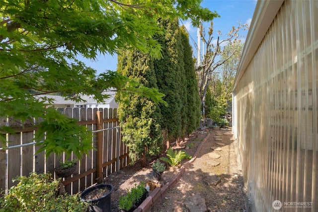 view of yard with fence
