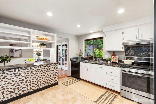kitchen with white cabinetry, under cabinet range hood, stainless steel range with gas stovetop, a sink, and dishwasher