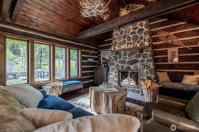 8105 Icicle Rd, Leavenworth, WA 98826 - living area featuring wood walls, hardwood / wood-style flooring, wood ceiling, a stone fireplace, and vaulted ceiling with beams