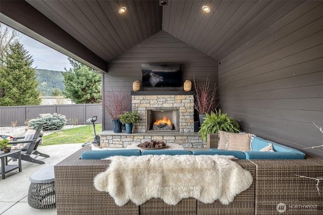 8105 Icicle Rd, Leavenworth, WA 98826 - view of patio / terrace featuring an outdoor living space with a fireplace and fence