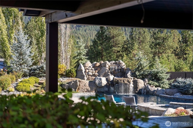 8105 Icicle Rd, Leavenworth, WA 98826 - exterior details with a view of trees and fence