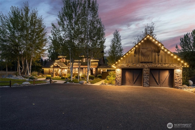 8105 Icicle Rd, Leavenworth, WA 98826 - view of front of home featuring stone siding and board and batten siding