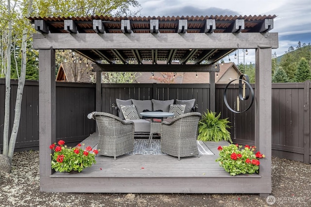 8105 Icicle Rd, Leavenworth, WA 98826 - wooden terrace with outdoor dining space, a pergola, and a fenced backyard