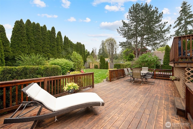deck with outdoor dining space