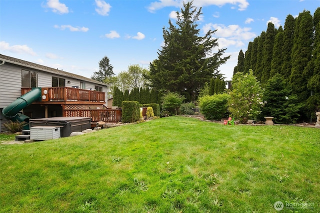 view of yard with a deck