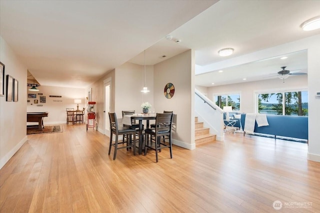 1447 Everette Ln, Freeland, WA 98249 - dining space with a ceiling fan, baseboards, recessed lighting, light wood-type flooring, and stairway