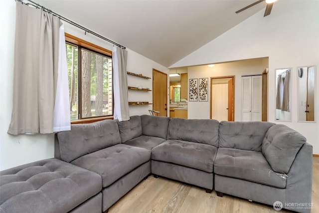 17936 Clearland Blvd SE, Yelm, WA 98597 - living area featuring vaulted ceiling, light wood-style floors, and a ceiling fan