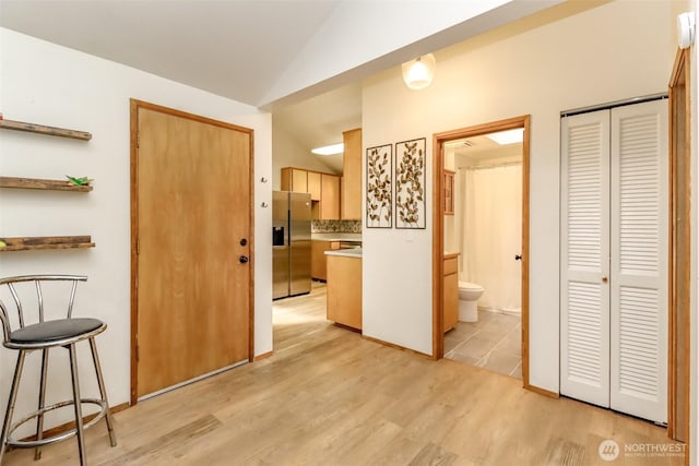 17936 Clearland Blvd SE, Yelm, WA 98597 - corridor featuring vaulted ceiling and light wood-style flooring