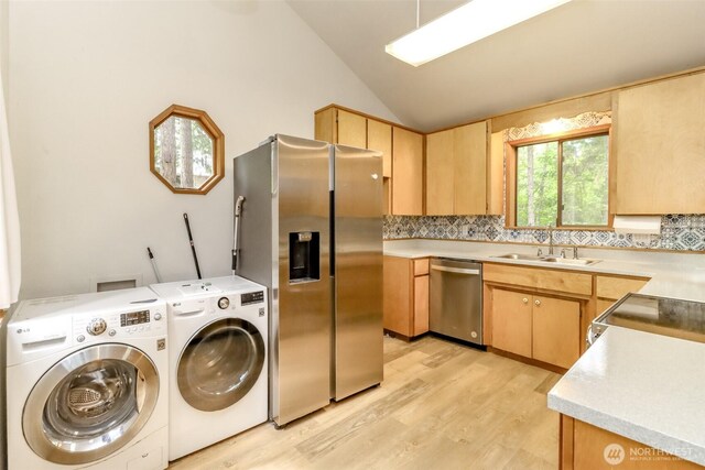 17936 Clearland Blvd SE, Yelm, WA 98597 - washroom featuring washer and dryer and light wood-type flooring