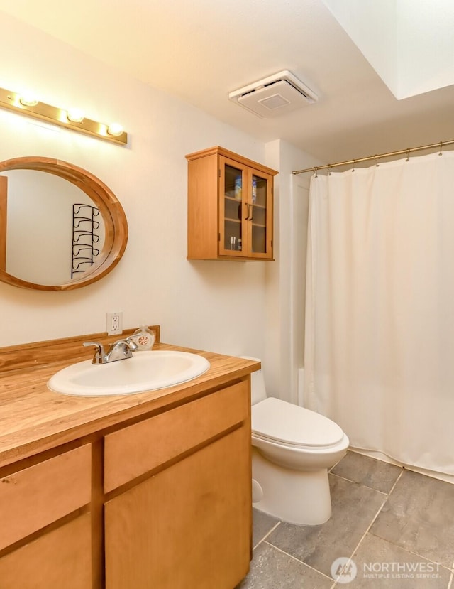 17936 Clearland Blvd SE, Yelm, WA 98597 - bathroom with toilet, vanity, tile patterned flooring, and curtained shower