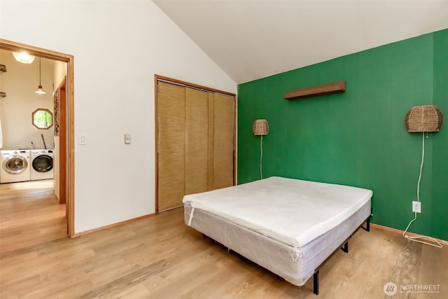 17936 Clearland Blvd SE, Yelm, WA 98597 - bedroom featuring washer and clothes dryer, light wood-type flooring, lofted ceiling, a closet, and pool table