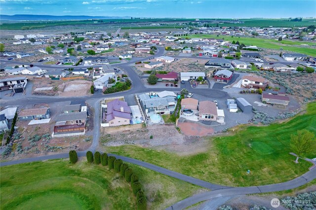 aerial view featuring a residential view and golf course view