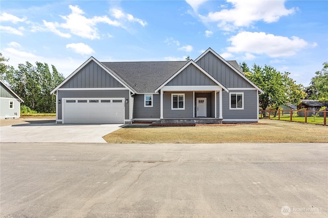 1200 E Georgia Ln, Everson, WA 98247 - view of front of property featuring board and batten siding, driveway, covered porch, and a garage