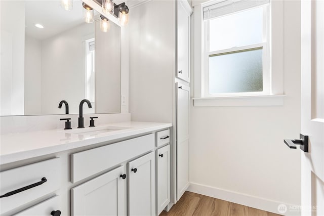 1200 E Georgia Ln, Everson, WA 98247 - bathroom with vanity, plenty of natural light, wood finished floors, and recessed lighting